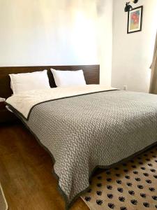 Ένα ή περισσότερα κρεβάτια σε δωμάτιο στο Uma Residency