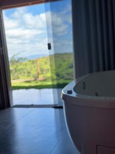 Billede fra billedgalleriet på Moeda Bier loft - Pet friendly com banheira e vista da Serra da Moeda i Moeda + 30 billeder