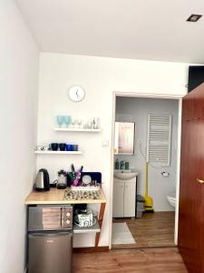 Kuchyňa alebo kuchynka v ubytovaní Apartamencik Centrum
