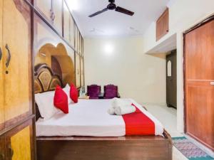 Voodi või voodid majutusasutuse Hotel O Smart View toas