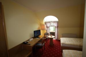 TV a/nebo společenská místnost v ubytování Hotel Bürgerhof