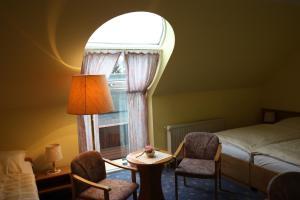 Postel nebo postele na pokoji v ubytování Hotel Bürgerhof