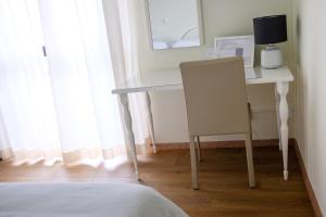 TV a/nebo společenská místnost v ubytování Hotel L'Approdo