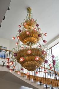 a large chandelier hanging from a ceiling at Grand Hotel Flora in Sorrento