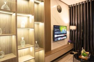 TV a/nebo společenská místnost v ubytování Spring Home Hà Nội