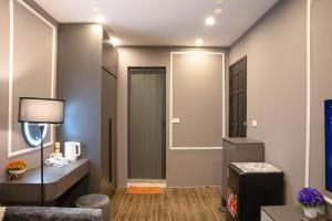 Postel nebo postele na pokoji v ubytování Spring Home Hà Nội