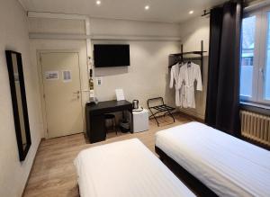 A bed or beds in a room at Albert - Rooms