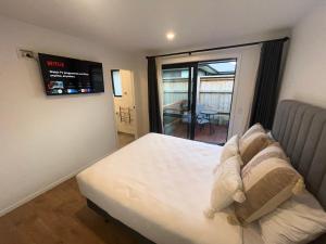 Letto o letti in una camera di Studio in Glenorchy