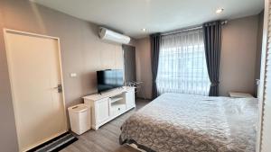 Postel nebo postele na pokoji v ubytování Indy2 Bangna km7 By koii + 16 fotografií