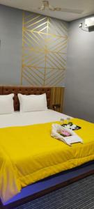 The Promise Hotel and Resort客房内的一张或多张床位
