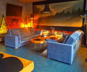 Część wypoczynkowa w obiekcie Apartamenty SPOKOLOKO Skrzyczne Residence Korzenny i Kamienny