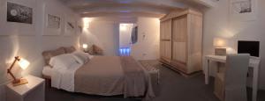 Posteľ alebo postele v izbe v ubytovaní Relais Chambre