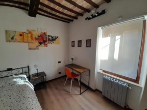 Posteľ alebo postele v izbe v ubytovaní La Casa dei Bersaglieri