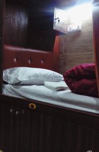 Postel nebo postele na pokoji v ubytování Unibed Dormitory