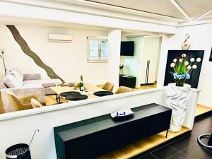 TV a/nebo společenská místnost v ubytování Ferienwohnung Wanderlust