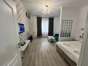 Ένα ή περισσότερα κρεβάτια σε δωμάτιο στο Bright & Beautiful Studio in Prime Location Walk to Everything