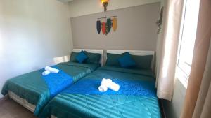 Postel nebo postele na pokoji v ubytování HUY HOANG II Hotel - Da Lat