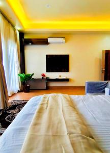 Μια τηλεόραση ή/και κέντρο ψυχαγωγίας στο Vila's Club Resort