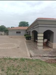a house with a patio and a garage at The Adress in Midrand