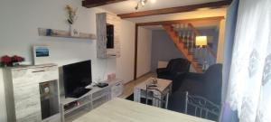 Posezení v ubytování S&H Ferienwohnung