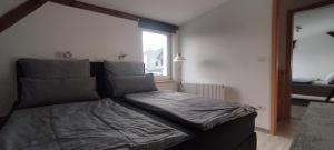 Postel nebo postele na pokoji v ubytování S&H Ferienwohnung