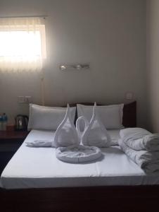 Letto o letti in una camera di Hotel Mantra and Adventure