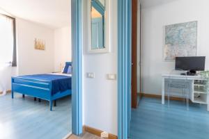 TV a/nebo společenská místnost v ubytování Blu Al Lago - Lago di Como