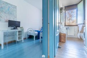 TV a/nebo společenská místnost v ubytování Blu Al Lago - Lago di Como