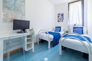 Postel nebo postele na pokoji v ubytování Blu Al Lago - Lago di Como