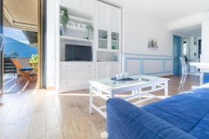 TV a/nebo společenská místnost v ubytování Blu Al Lago - Lago di Como