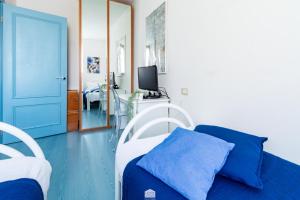 TV a/nebo společenská místnost v ubytování Blu Al Lago - Lago di Como