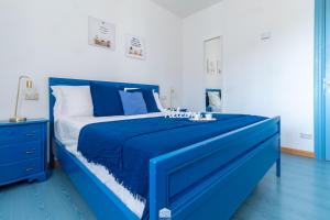 Postel nebo postele na pokoji v ubytování Blu Al Lago - Lago di Como
