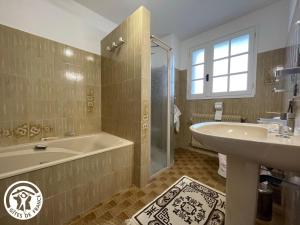 Koupelna v ubytování Brise de l ocean + 7 fotografií