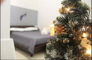 Postel nebo postele na pokoji v ubytování KiMia Home, Centro
