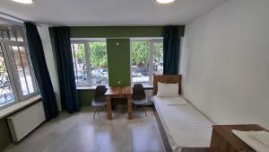 Postel nebo postele na pokoji v ubytování Best Hostel