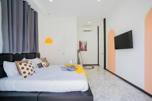 Μια τηλεόραση ή/και κέντρο ψυχαγωγίας στο Cherish House Pool Villa