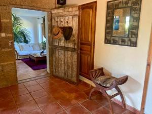 Posezení v ubytování Maison d'Hotes Le Chai d'Armagnac