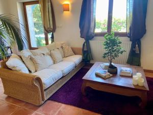 Posezení v ubytování Maison d'Hotes Le Chai d'Armagnac
