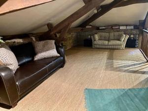 Posezení v ubytování Maison d'Hotes Le Chai d'Armagnac