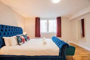 Ένα ή περισσότερα κρεβάτια σε δωμάτιο στο Merchants Rest