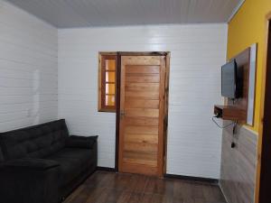 Et tv og/eller underholdning på Cabanas La Colonial no Centro