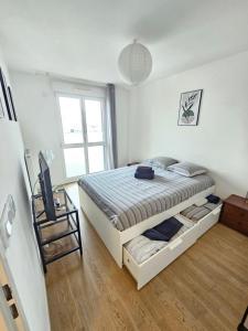 Postel nebo postele na pokoji v ubytování Cocon Chic - 1 Chambre