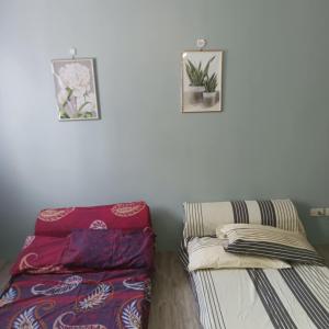 Postel nebo postele na pokoji v ubytování Josephine Macatula