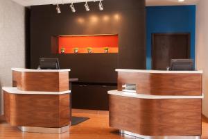 an office with a reception desk with at Courtyard by Marriott Charlotte Gastonia in Gastonia