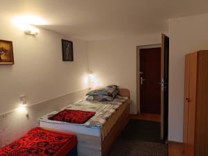 Posteľ alebo postele v izbe v ubytovaní Aura