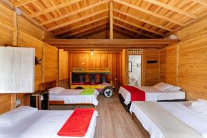 Postel nebo postele na pokoji v ubytování Hotel Orillas del Pizano