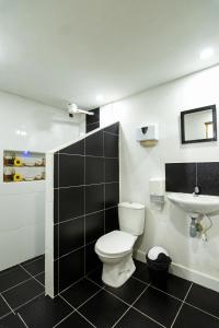 Koupelna v ubytování Hotel Orillas del Pizano