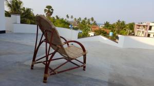 Rõdu või terrass majutusasutuses Thangamani Guest