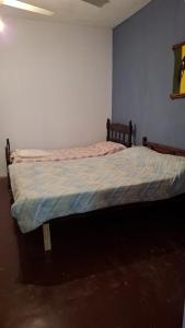 Ένα ή περισσότερα κρεβάτια σε δωμάτιο στο Casa en Claromecó