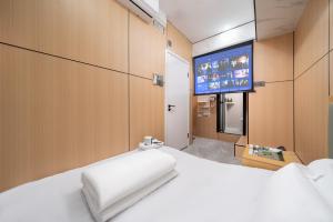 Postel nebo postele na pokoji v ubytování Windsor Hella Inn